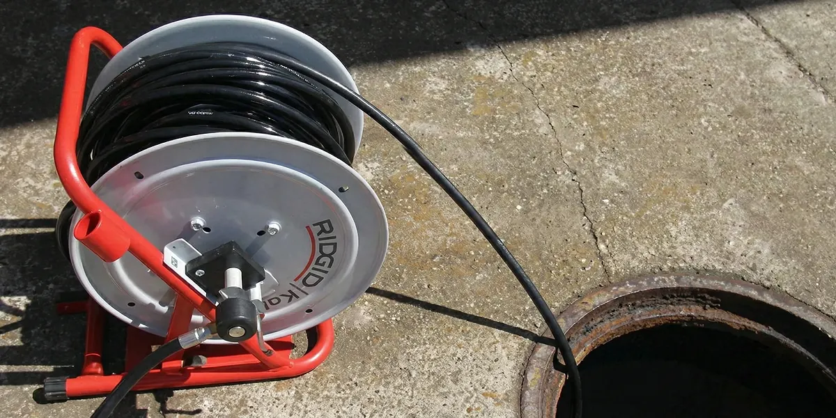 sewer rodding equipment prepared to clear clogged sewer lines in Scottsdale, AZ