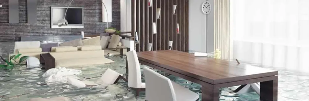 home interior affected by water damage with flooded floors and displaced furniture in Scottsdale, AZ